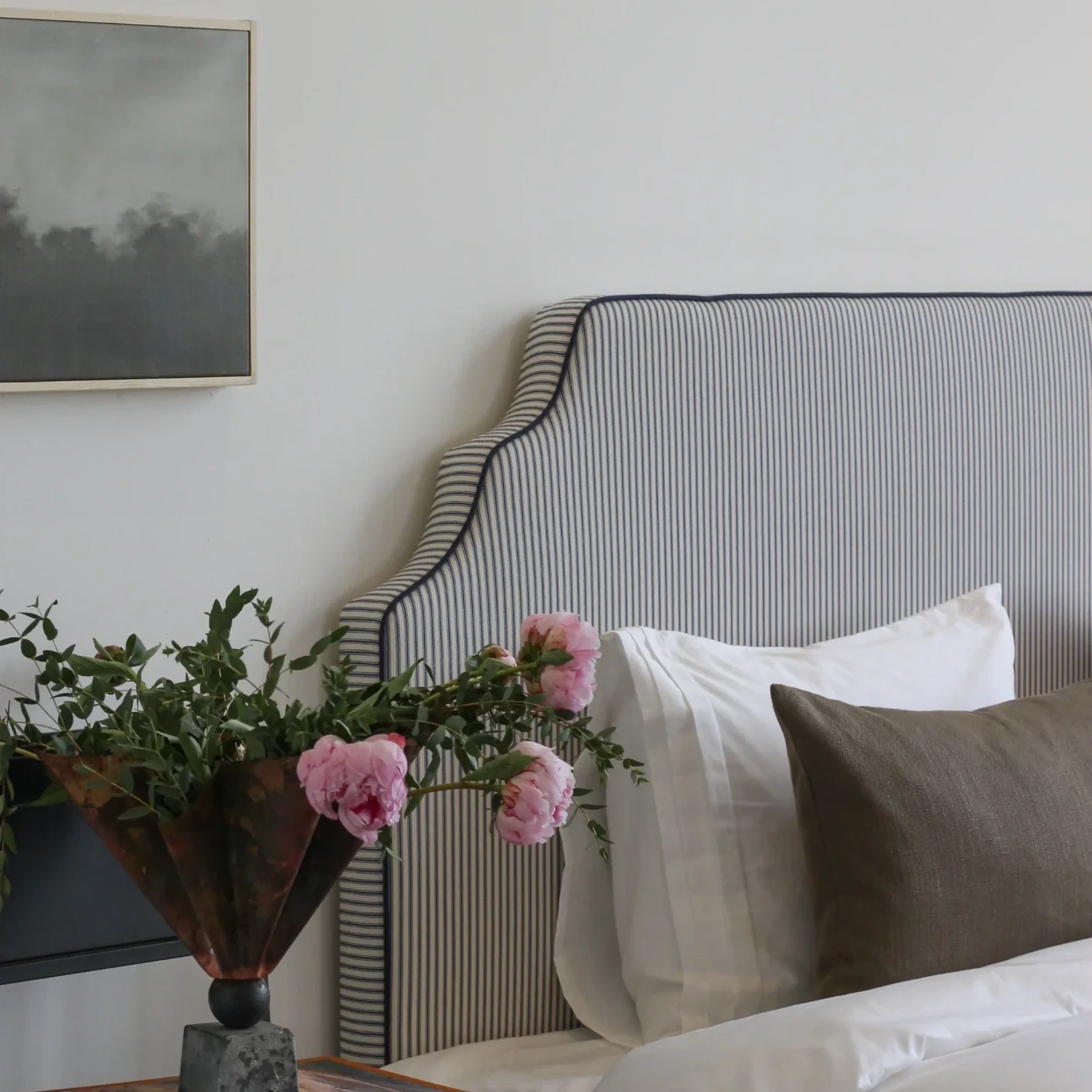 Bespoke headboard upholstered in Ian Mankin Ticking Stripe, navy